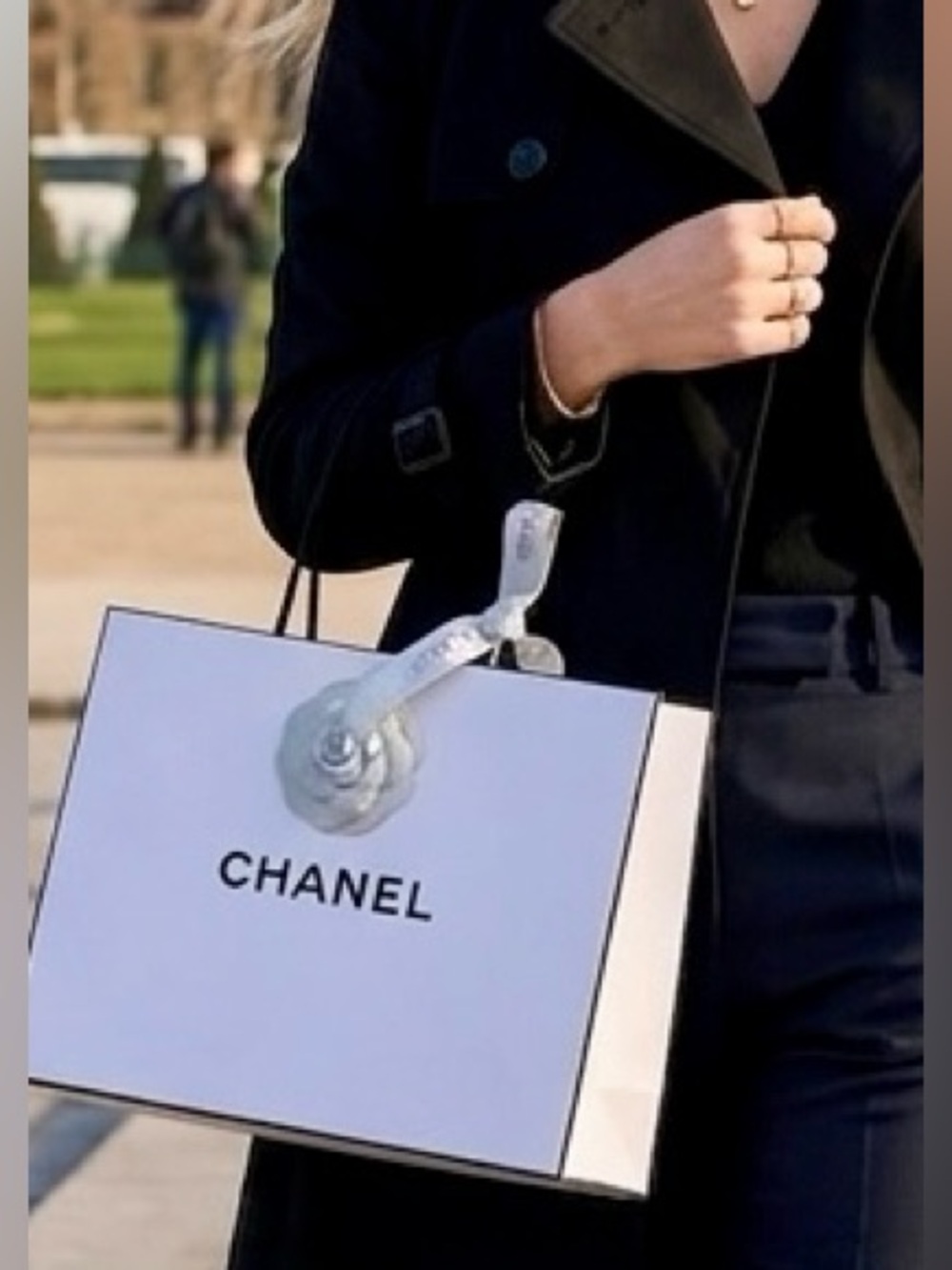 Chanel White Shopping Bag with Chanels iconic Black Logo.